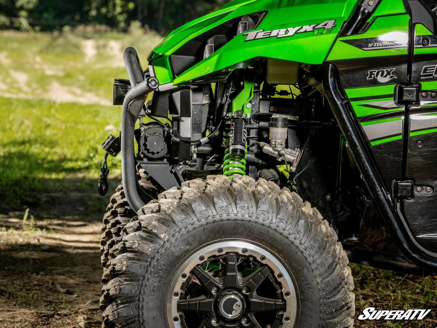 Close up side view of the Kawasaki Teryx front bumper with a winch attached to the bumper.